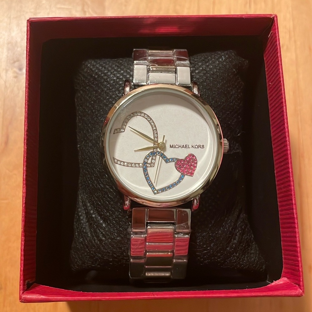 Michael Kor’s Women’s Heart Watch
New Without Tags plastic still on wri…